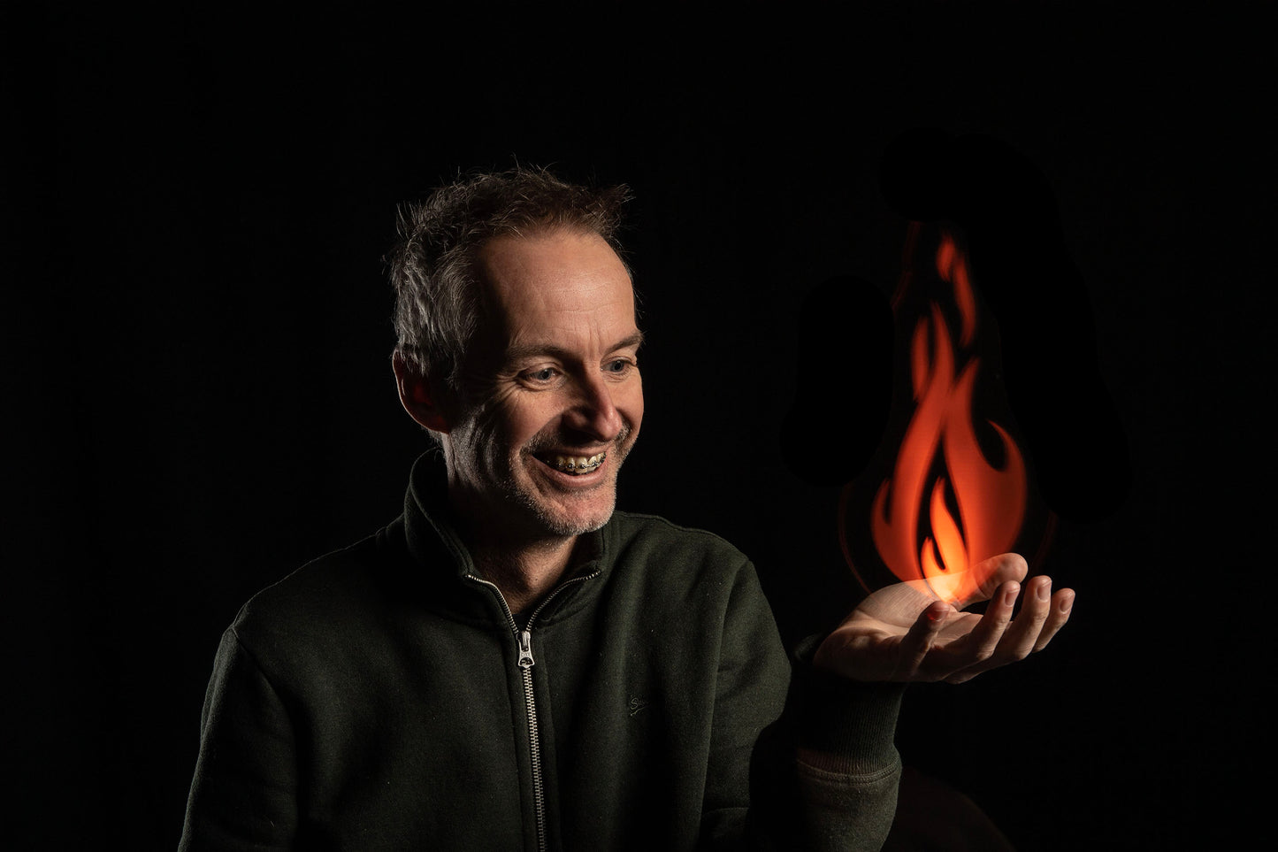 model with fire on hand, blade photography