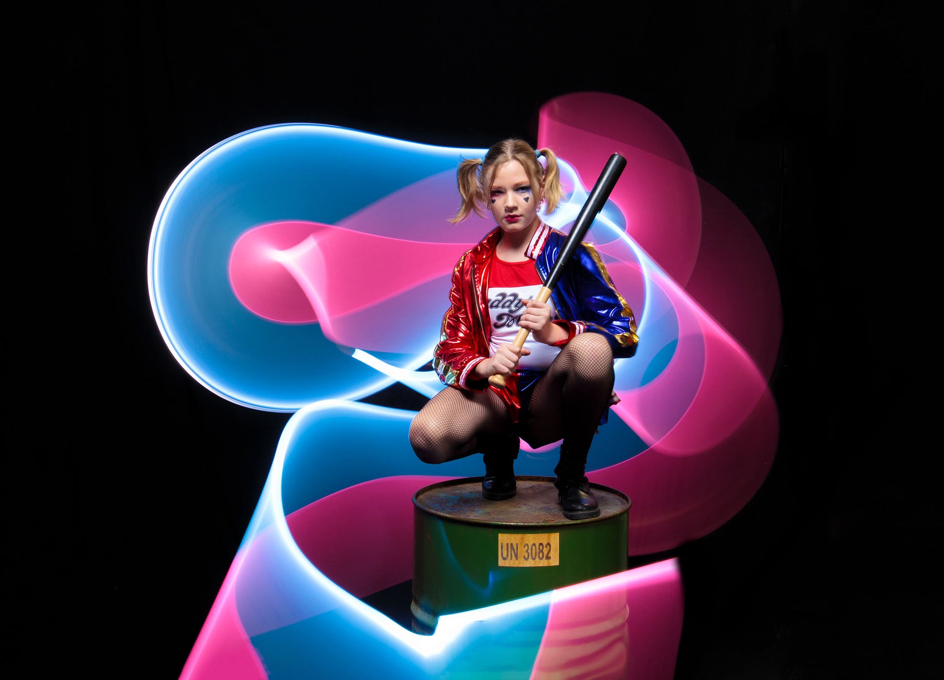 Harley Quinn with light tube blue pink painting photography