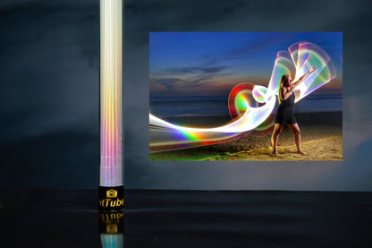 light painting on the beach with holographic color tube