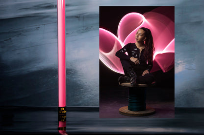 Topmodel with pink light tube, cool graffiti with light